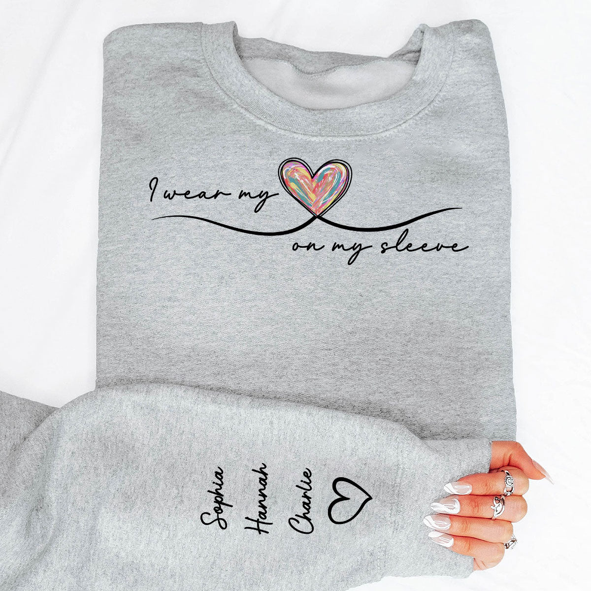 Grandma Wears Her Heart On Her Sleeve, Colorful Heart, Gift For Grandma And Mom, Personalized Sleeve Printed Sweatshirt