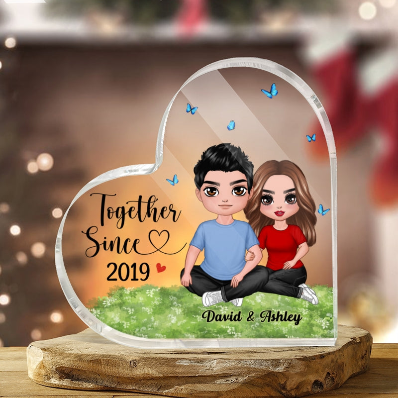 Embracing Couple Sitting On Grass Personalized Heart-Shaped Acrylic Plaque
