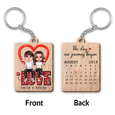 Realistic Doll Couple Sitting On LOVE Calendar Personalized Wooden Keychain