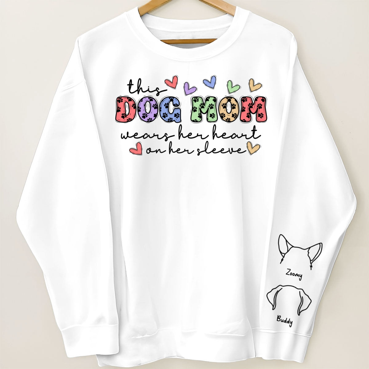 Dog Mom Colorful Paw Pattern, This Dog Mom Wears Her Heart On Her Sleeve, Custom Dog Name, Dog Mama, Personalized Sleeve Printed Sweatshirt