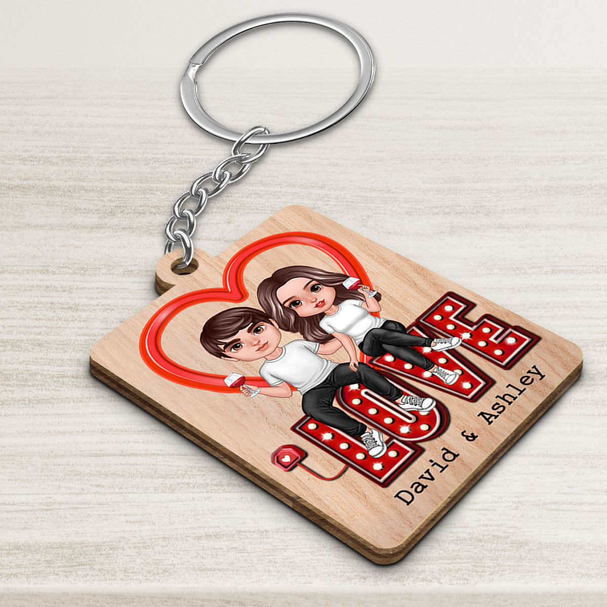 Realistic Doll Couple Sitting On LOVE Calendar Personalized Wooden Keychain