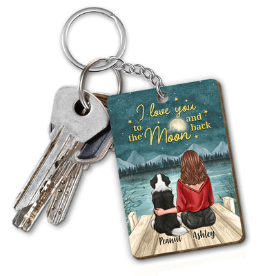 Back View Woman Sitting With Dogs I Love You To The Moon And Back Personalized Wooden Keychain