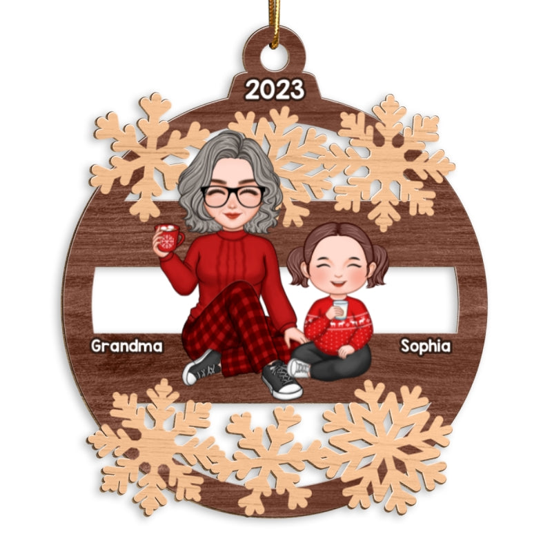 Cute Grandma And Grandkid Sitting In Snowflake Christmas Personalized Wooden Ornament