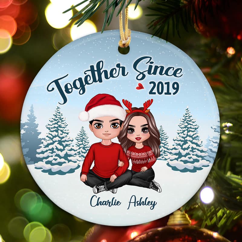 Embracing Couple Sitting In Snow Personalized Circle Ornament