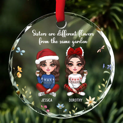 Sisters Are Differents Flowers From The Same Garden, Doll Sisters Sitting Personalized Glass Ornament, Christmas Gift For Sisters