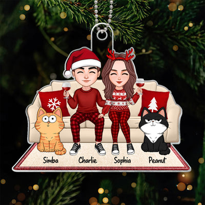 Cute Couple Sitting With Fluffy Funny Expression Cats On Christmas Sofa Personalized Acrylic Ornament