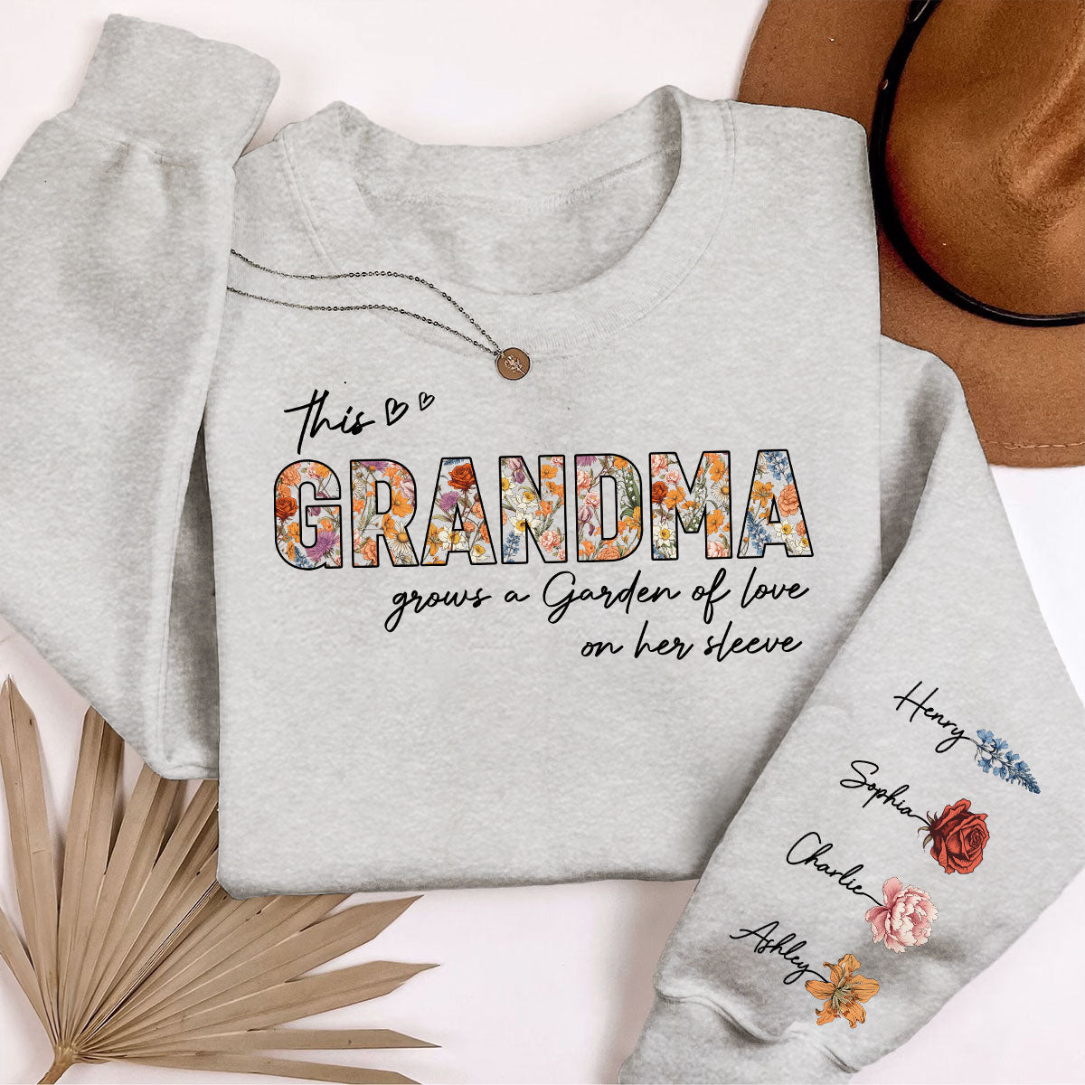 This Grandma Mom Grows A Garden Of Love On Her Sleeve Vintage Birth Flower Personalized Sleeve Printed Sweatshirt